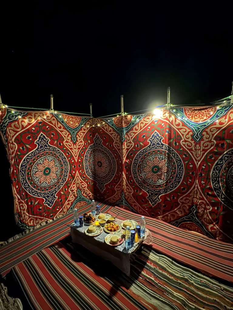 Bedouin dinner served in a tent at the desert eclipse camp