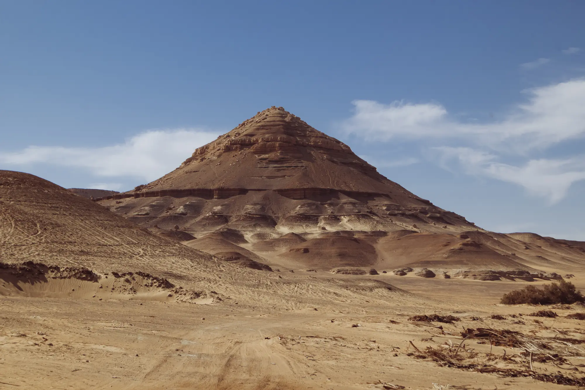 Conical volcanic hill in the Black Desert, Egypt