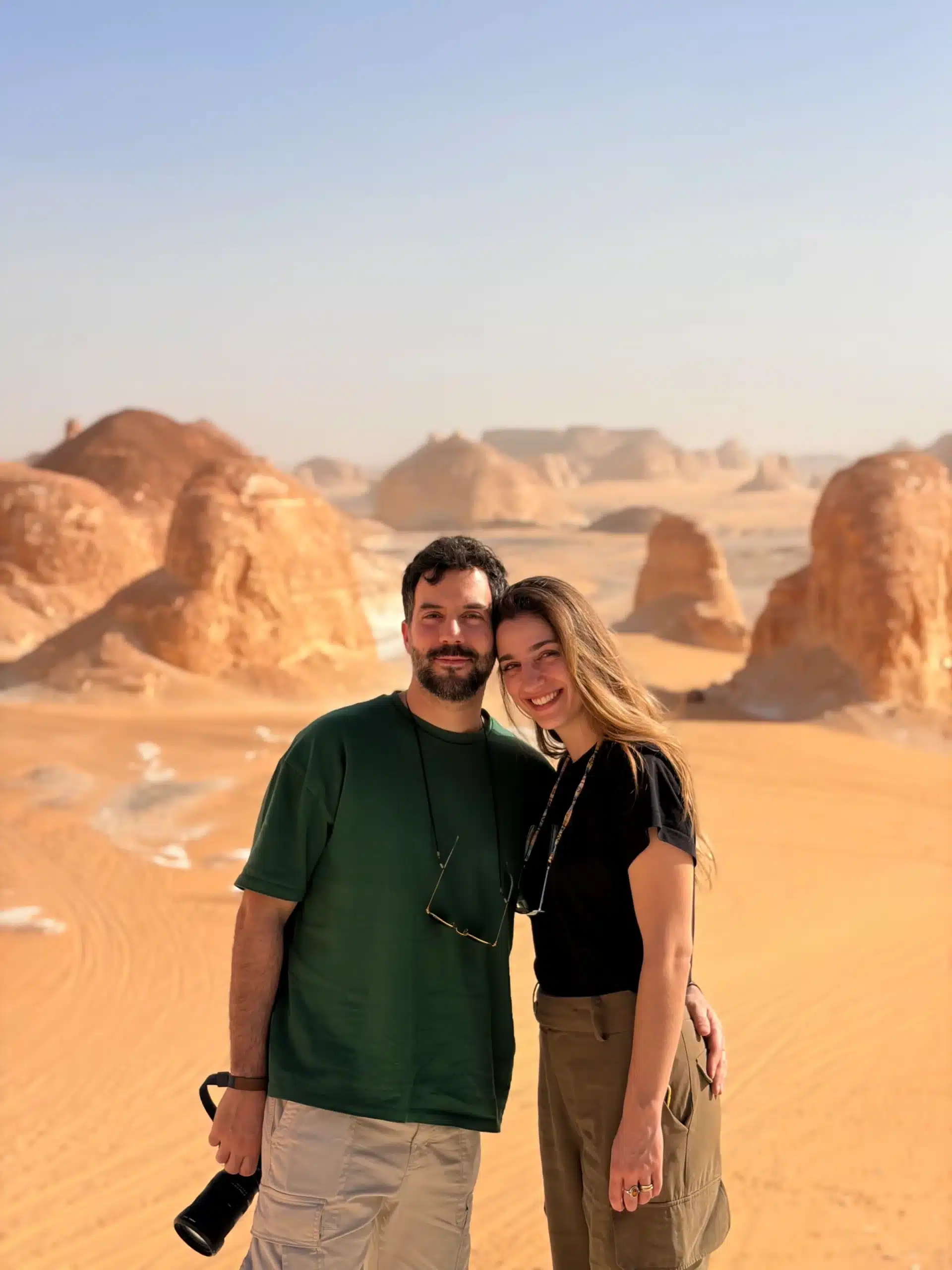 Couple enjoying a scenic landscape in Egypt's White Desert