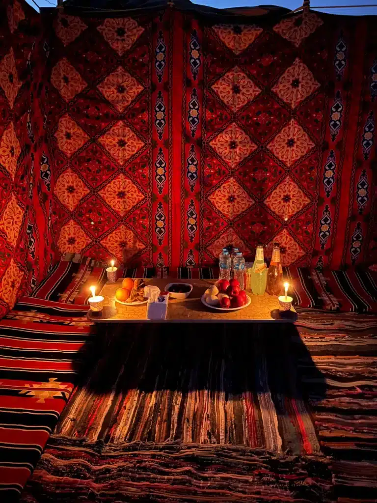 Dinner table set for guests at the desert eclipse camp