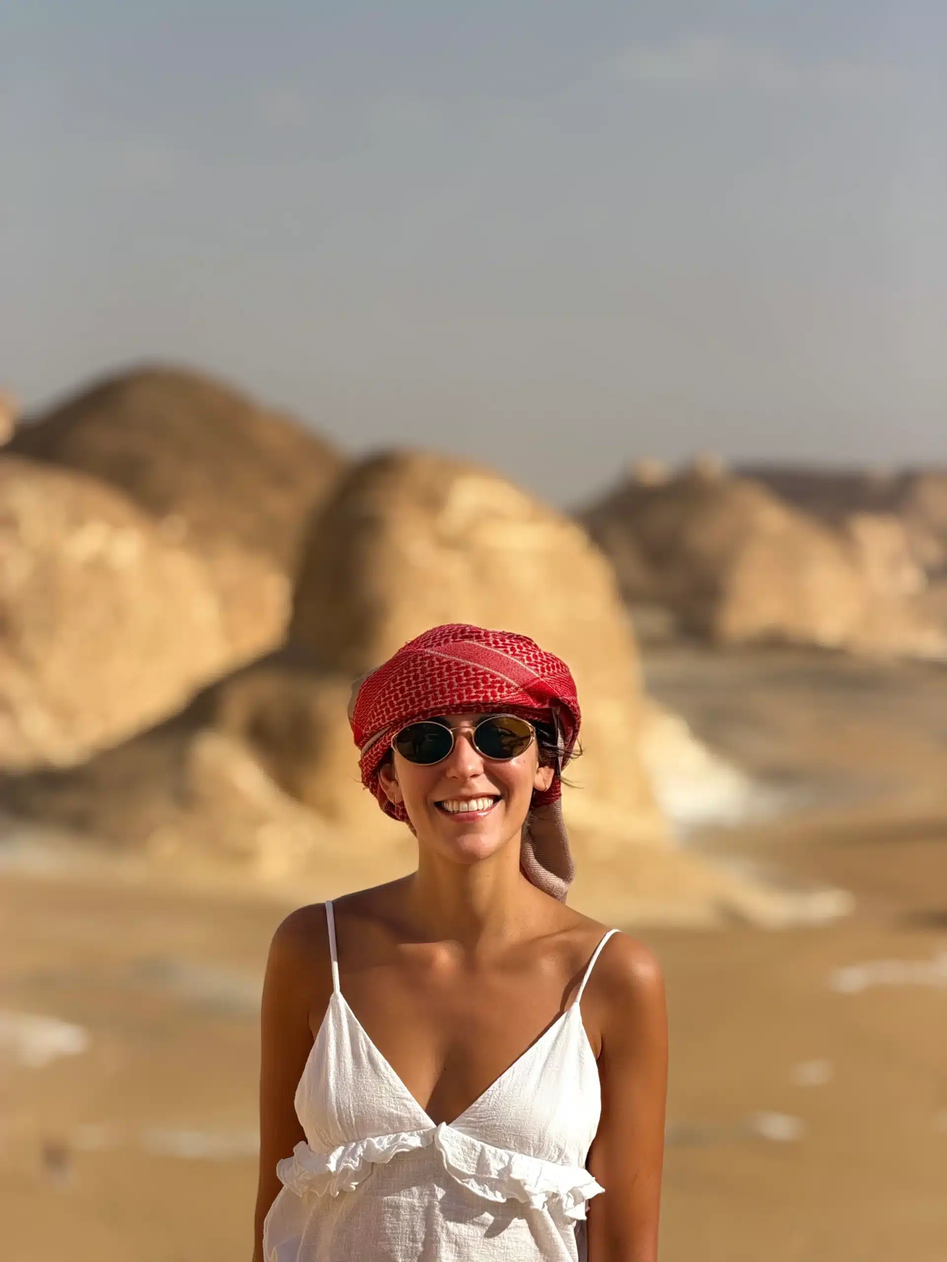 Traveler smiling in the White Desert of Egypt