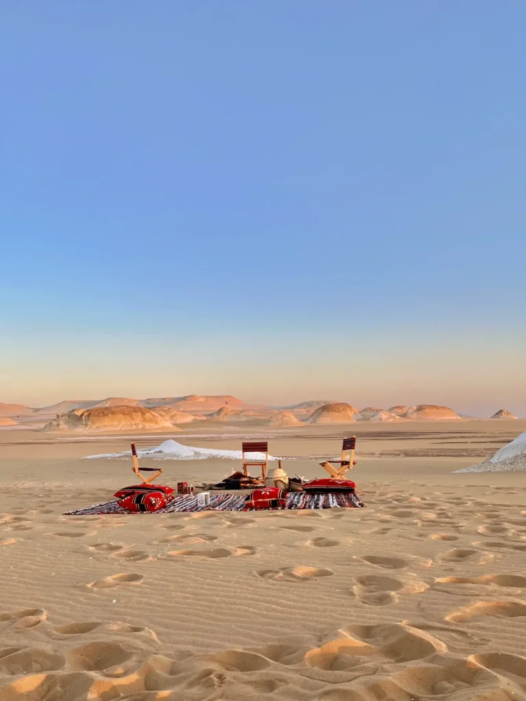 Camp seating facing the sunset in the White Desert
